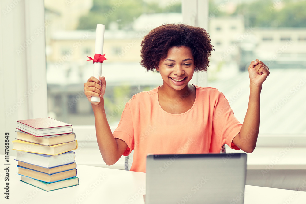 happy african woman with laptop, books and diploma happy african woman with laptop, books and diploma