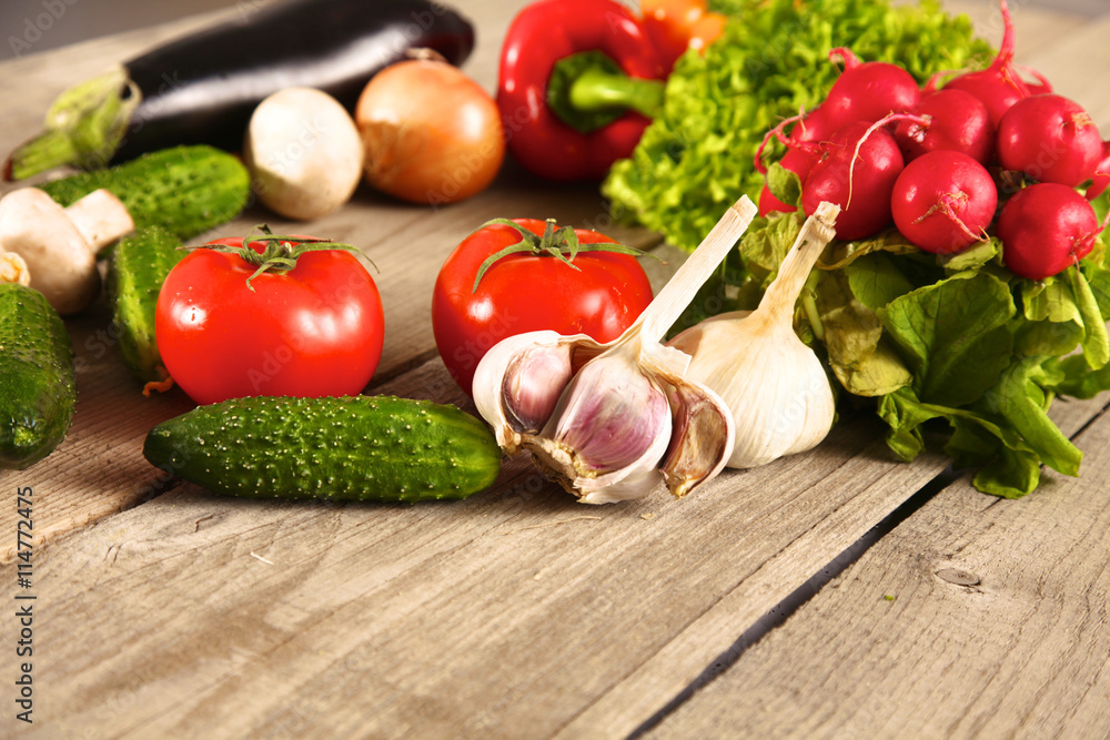 Fresh vegetables on a clean wooden table Fresh vegetables on a clean wooden table