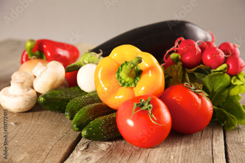 Fresh vegetables on a clean wooden table