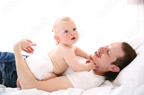 Young father having fun wit...