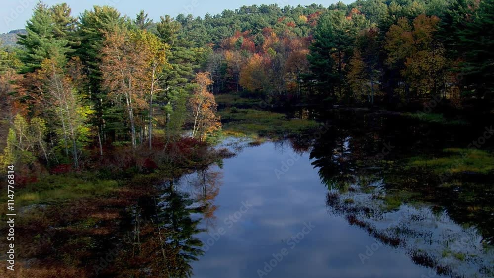 Wide aerial view of secluded New England lake Wide aerial view of secluded New England lake