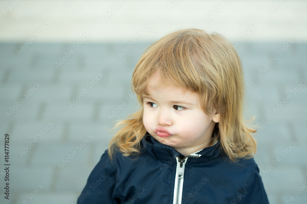 Little boy with pouted lips Little boy with pouted lips