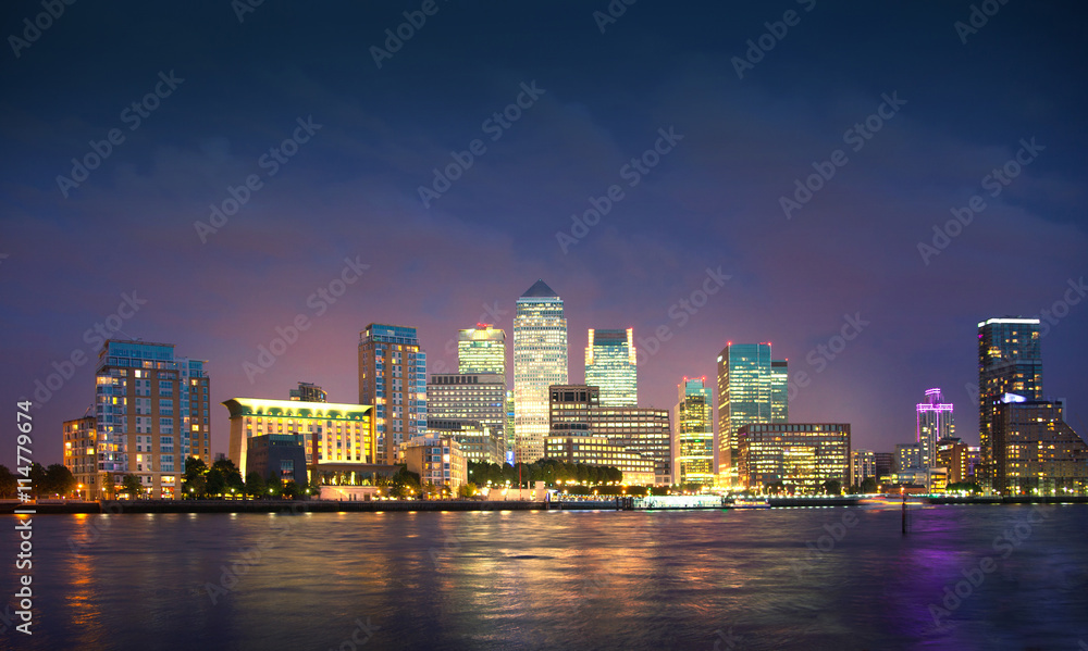 LONDON, UK - OCTOBER 17, 2014: Canary Wharf business and banking aria and first night lights
