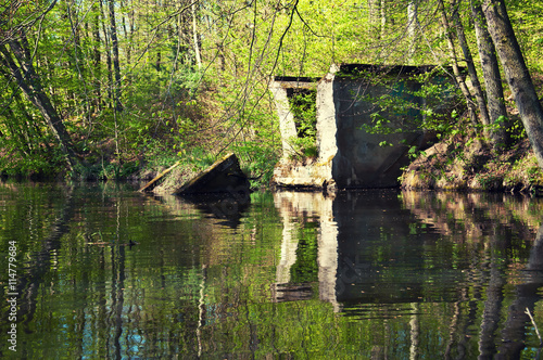 Old ruined bridge over the river