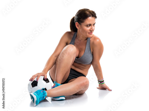 Sport woman playing football