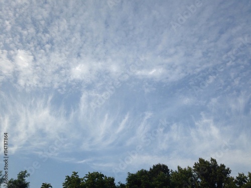 summer morning sky with mixed clouds