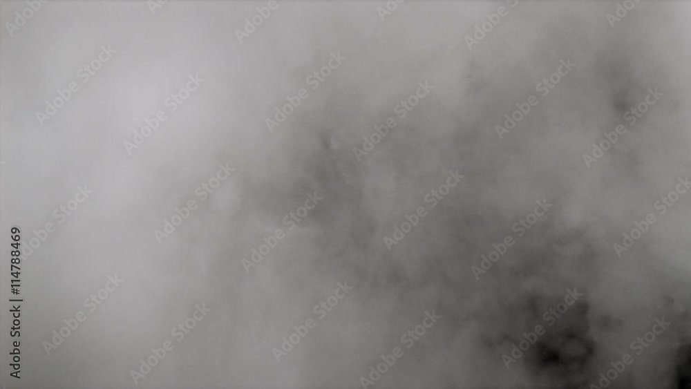 Turbulent smoke-screen swirling and billowing Turbulent smoke-screen swirling and billowing