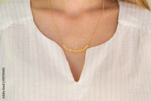 close up of gold neckless photo