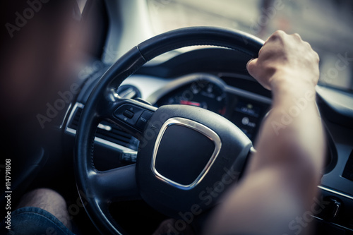 Hands on steering wheel © bizoo_n