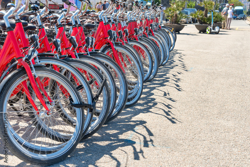 Group of red city bicycles