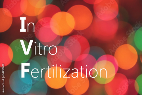 IVF (In Vitro Fertilization) acronym on colorful bokeh background photo