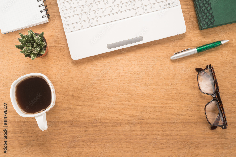 Office table with cup of coffee Office table with cup of coffee