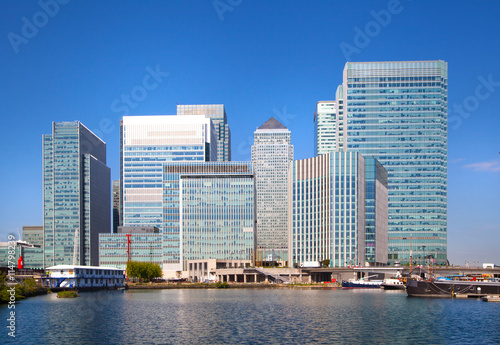 London UK- May 21, 2015: Office buildings of Canary Wharf, international business and banking aria. View from the dock