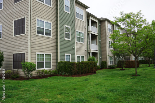 landscaping lawn and green tree in apartment community © nd700