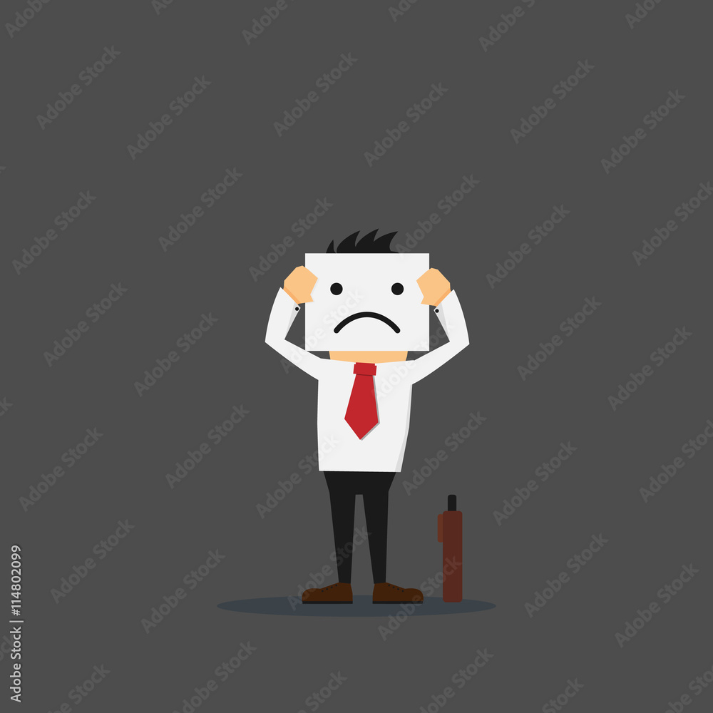 businessman holding white card with a sad face on it 