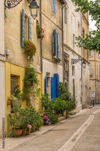 Fototapeta Naklejka Na Ścianę i Meble -  A colourful street in the city of Arles in the Bouches du Rhone Provence