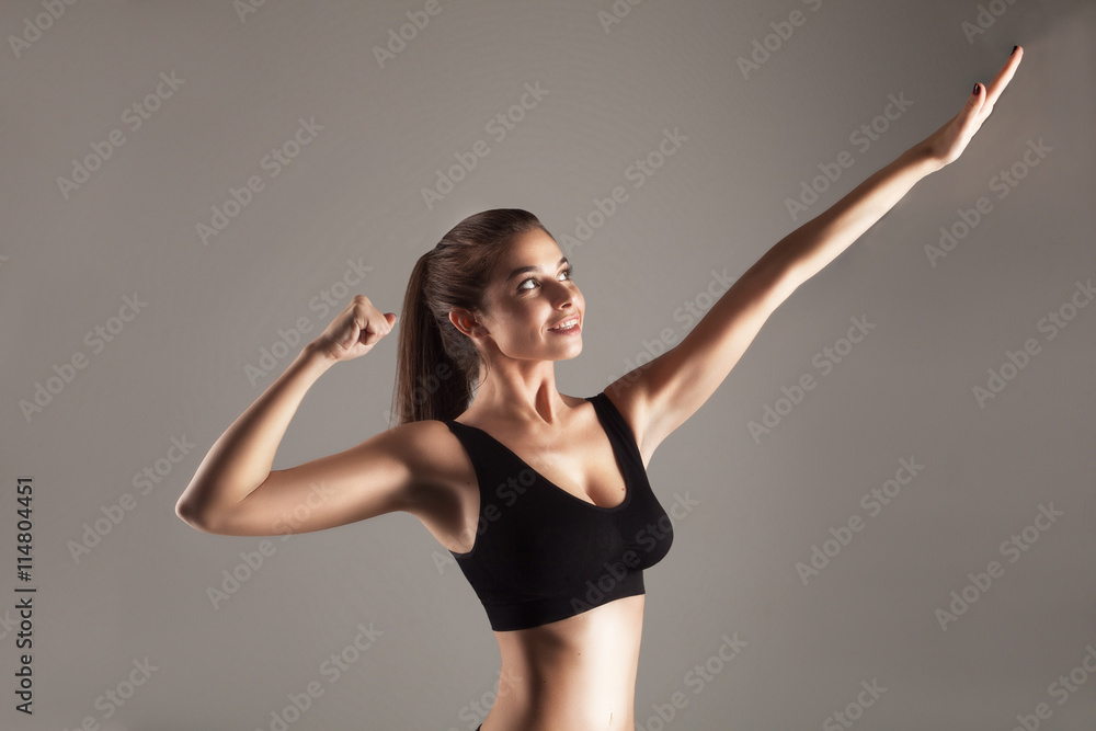 Attractive model doing strength training Attractive model doing strength training