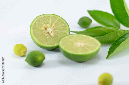 Fresh lime and slice, Isolated on white background. © oatpixels