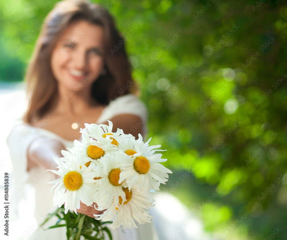 Woman with daisies