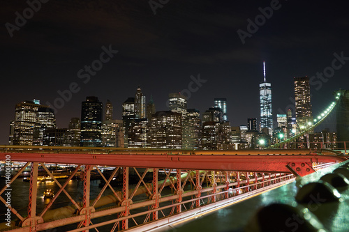 A look at night  from Brooklyn Bridge to the financial district in New York