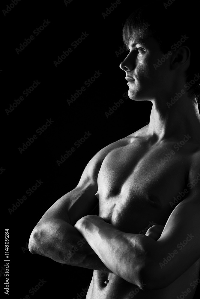 portrait of a young muscular naked man
