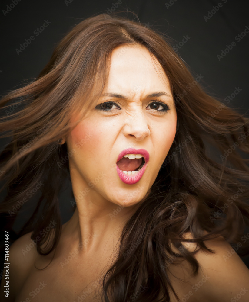 Portrait of a beautiful woman screaming Portrait of a beautiful woman screaming
