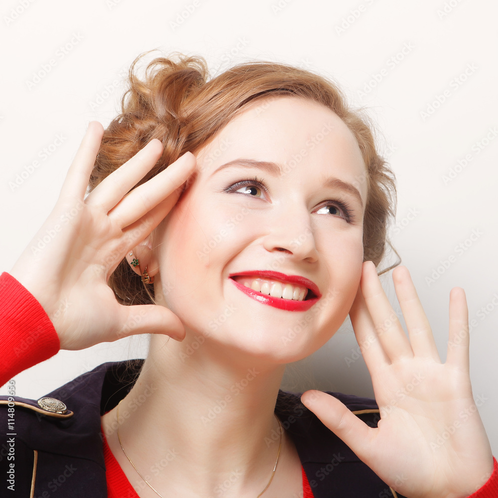 Fototapeta premium Close-up portrait of young beautiful woman with attractive tooth
