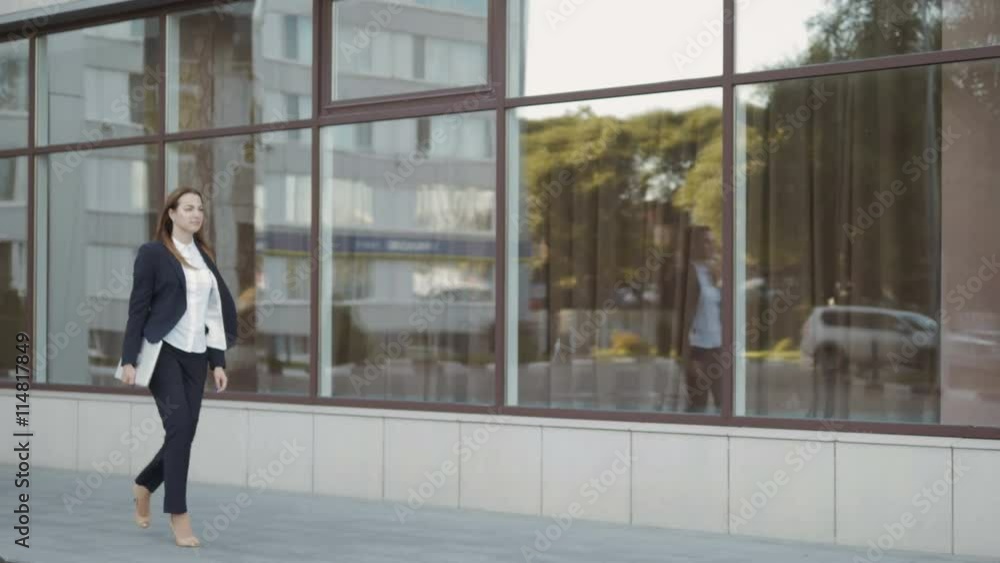 Business Woman Walking Outdoor In City. Office Worker In Downtown. Business Woman Walking Outdoor In City. Office Worker In Downtown.