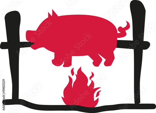 Suckling pig over flame
