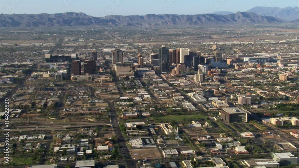 Wide orbit of Phoenix with downtown in mid-frame, mountains in background. Shot in 2007. Wide orbit of Phoenix with downtown in mid-frame, mountains in background. Shot in 2007.