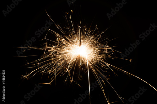 A spark over black background for Christmas and new year party