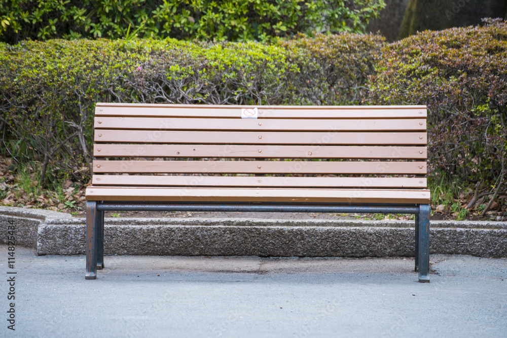 brown bench in the park