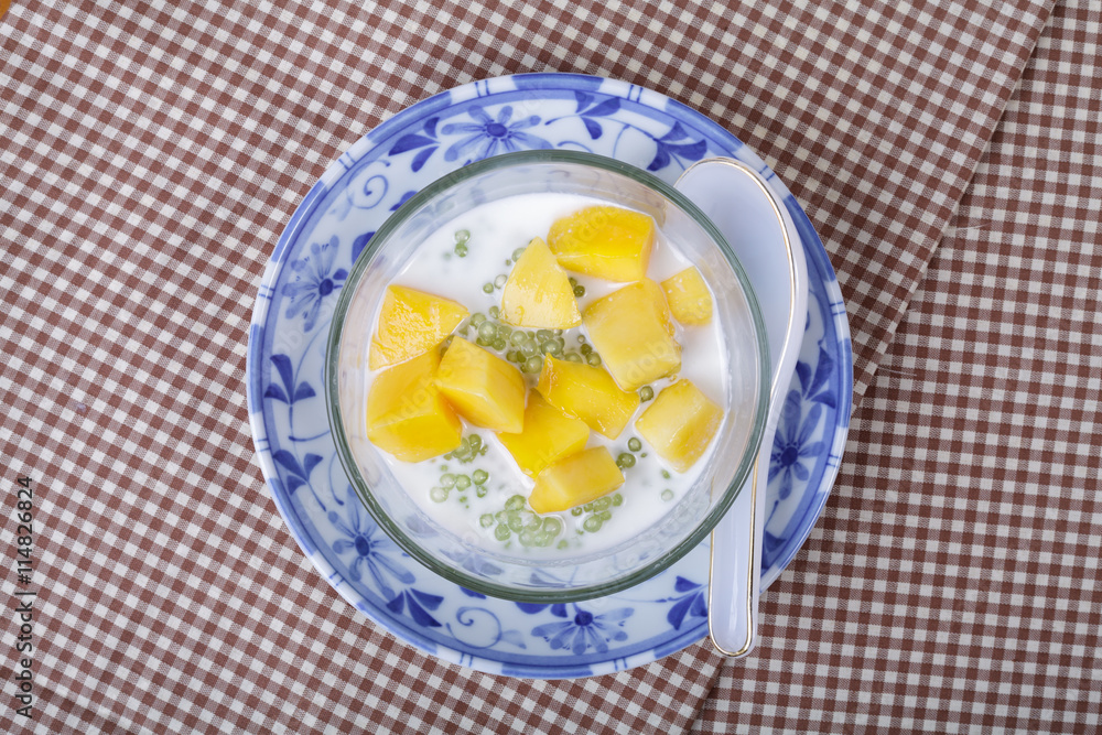 Thai dessert of sago with coconut milk and mango Thai dessert of sago with coconut milk and mango