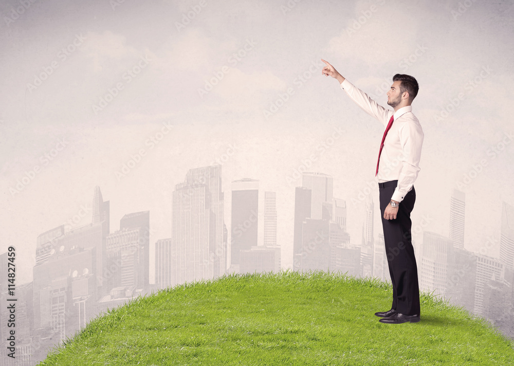 man standing in front of city landscape man standing in front of city landscape
