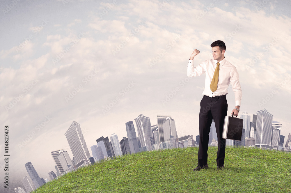 man standing in front of city landscape man standing in front of city landscape