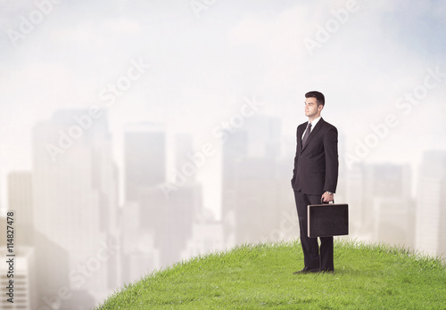 man standing in front of city landscape © ra2 studio