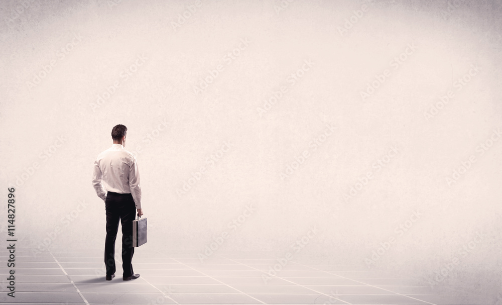 Business person standing in empty space Business person standing in empty space
