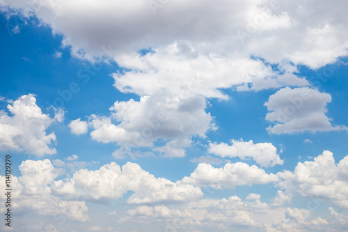 blue sky background with tiny clouds