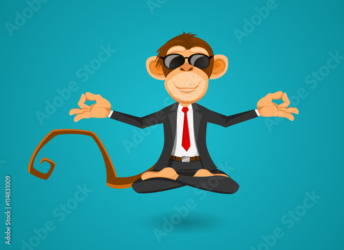 Monkey businessman in office training yoga