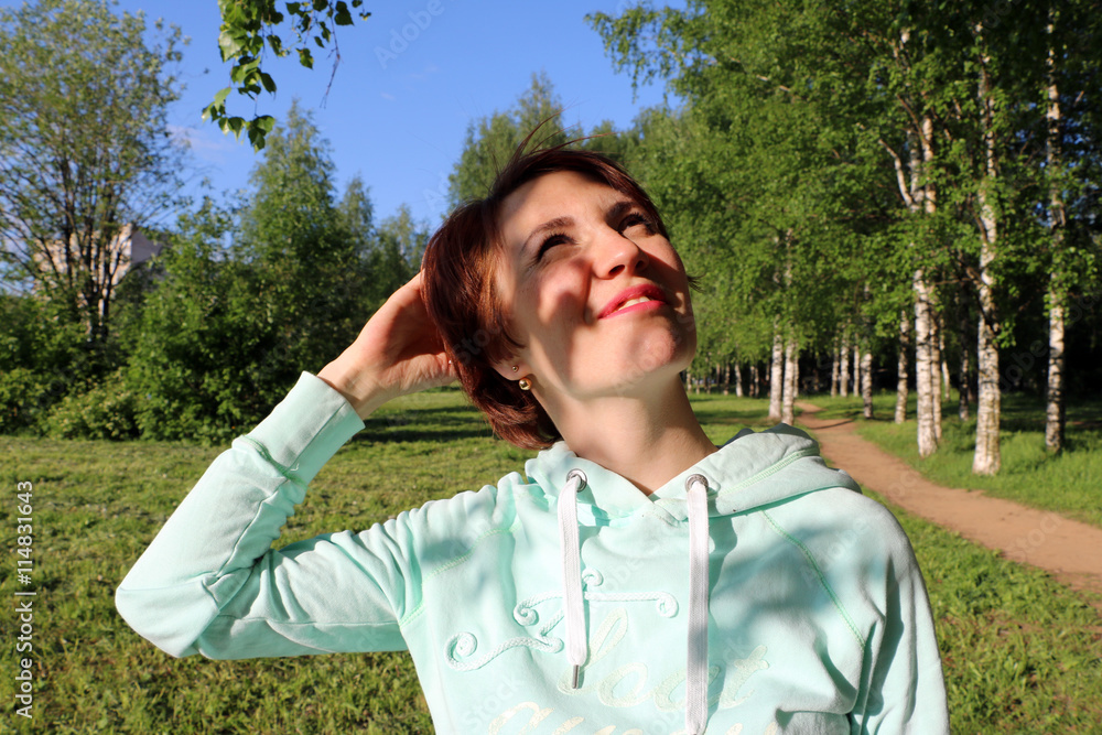Nice girl in the park in sunny day