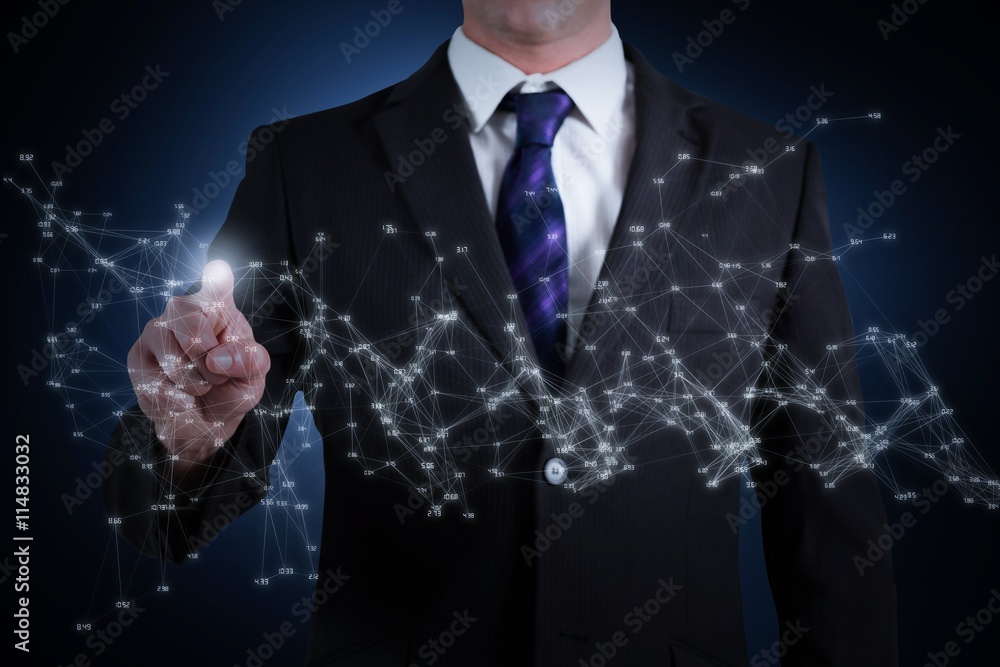 Composite image of businessman standing and pointing Composite image of businessman standing and pointing