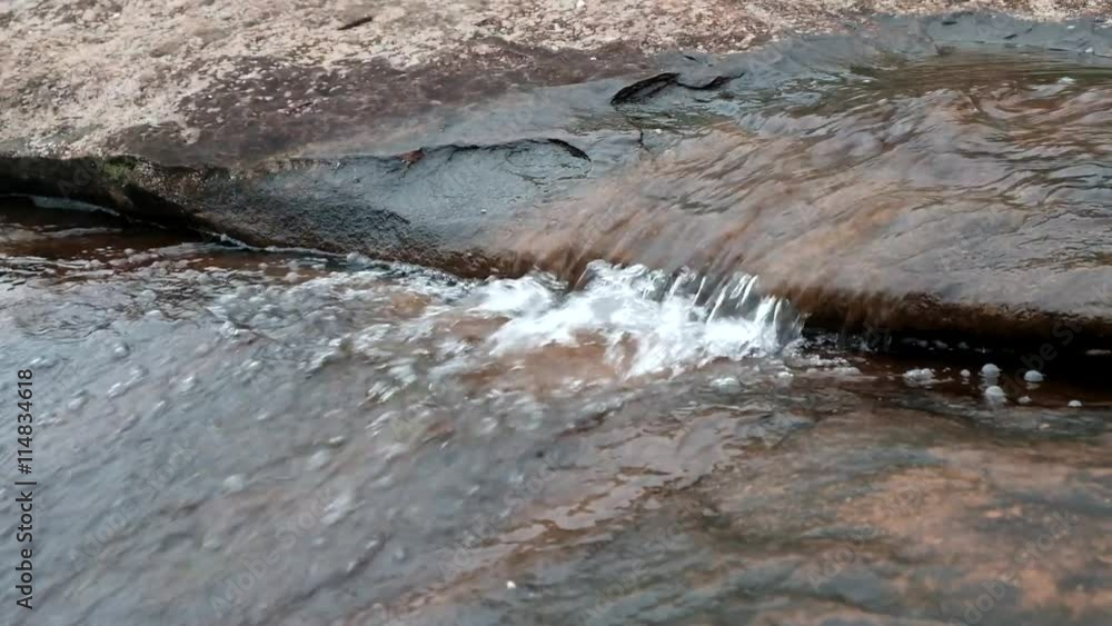 Small stream in the tropical rain forest due to heavy rain. Small stream in the tropical rain forest due to heavy rain.