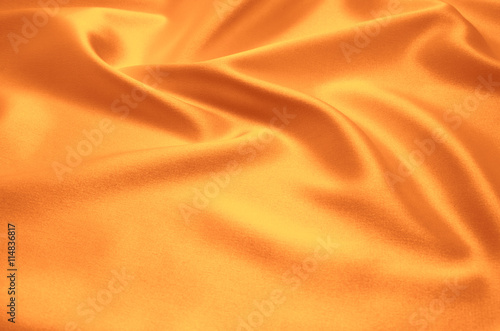 orange satin fabric as background