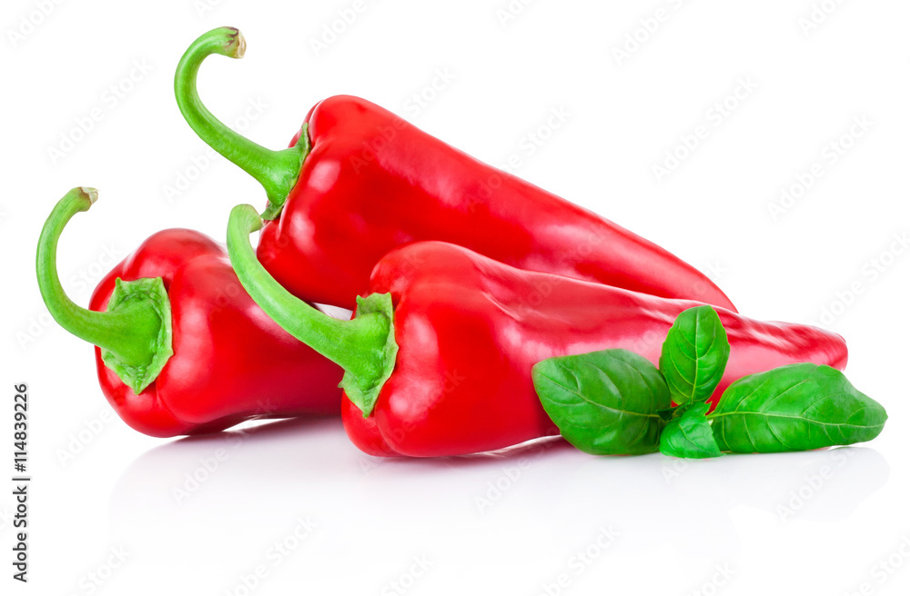 Three red hot peppers with leaf isolated on white background Three red hot peppers with leaf isolated on white background