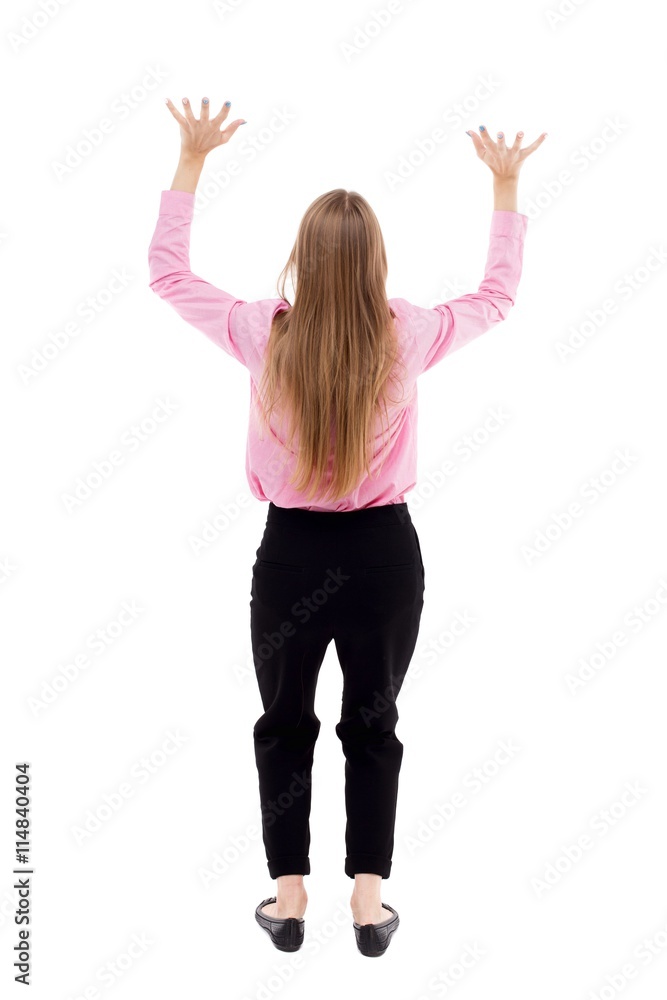 back view of business woman protects hands from what is falling back view of business woman protects hands from what is falling