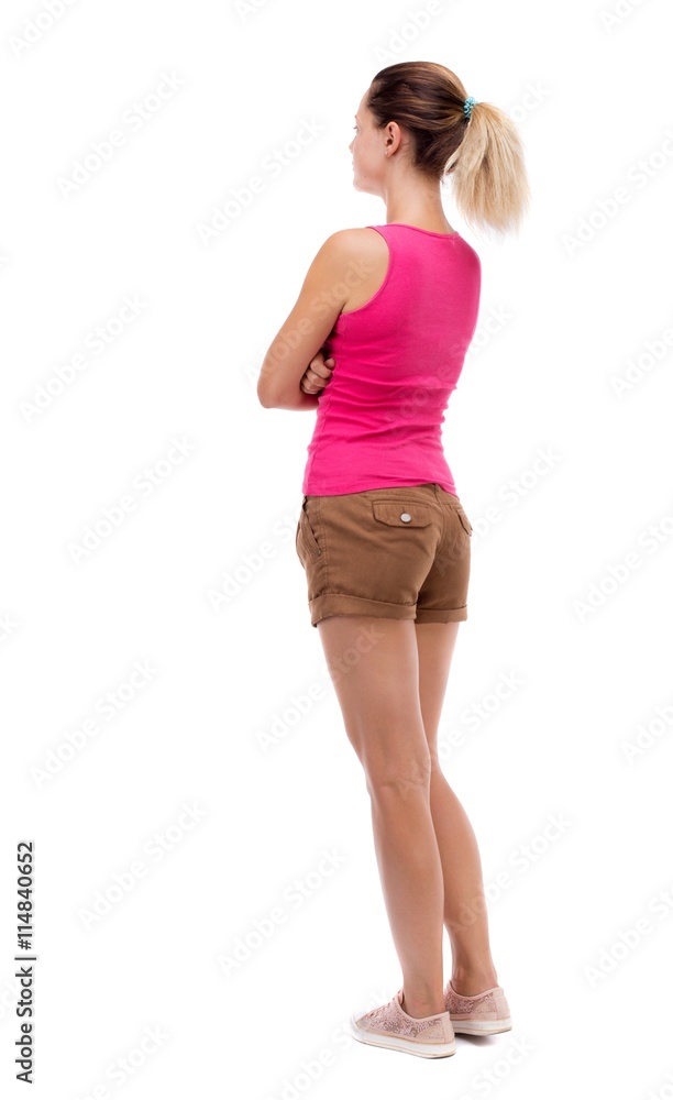 back view of standing young beautiful woman. back view of standing young beautiful woman.