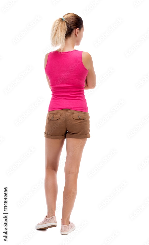 back view of standing young beautiful woman. back view of standing young beautiful woman.