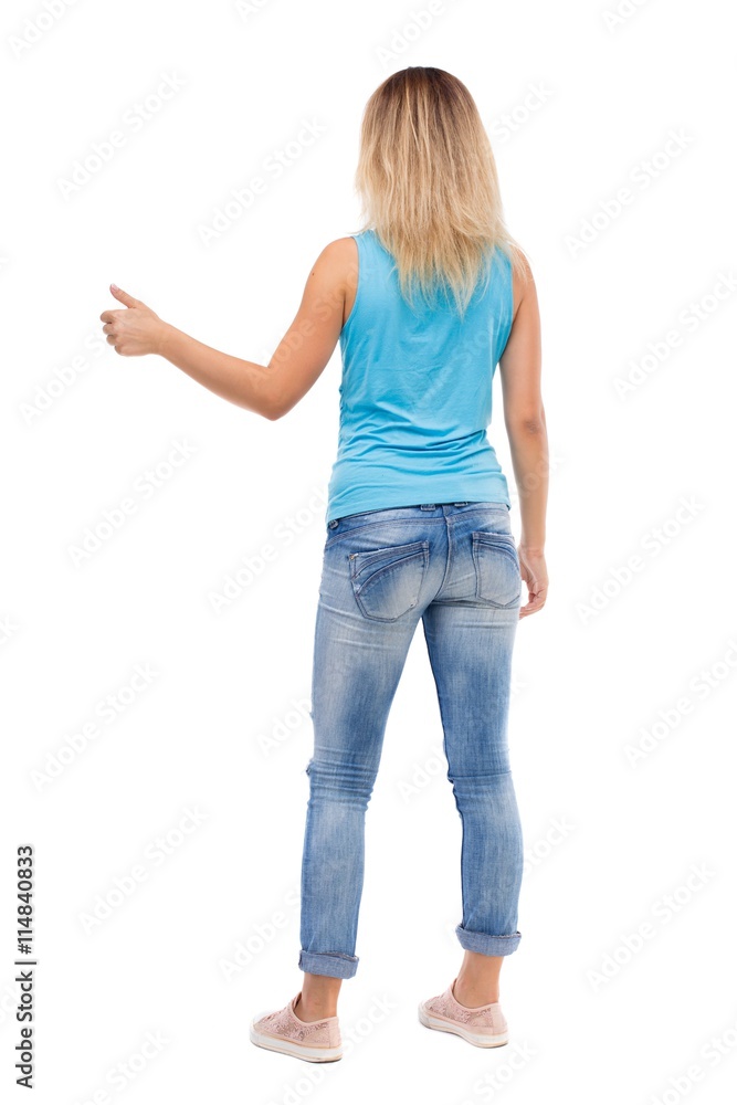 Back view of woman thumbs up. Back view of woman thumbs up.