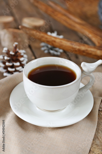 Beautiful winter composition with cup of hot drink © Africa Studio