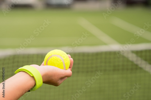 Professional tennis player carrying equipment © Yakobchuk Olena